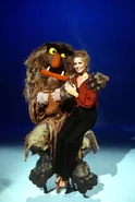 Cheryl Ladd sitting on Sweetums's lap.