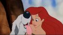 Max is very happy to see Ariel again and prepares to give her a kiss.