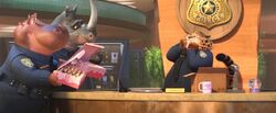 Clawhauser receiving donuts
