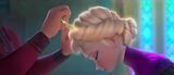 Elsa being crowned at her coronation, before her cryokinetic abilities are revealed