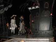 Captain Hook and The Queen in the Magic Kingdom parade, SpectroMagic, in what is not their natural outfits