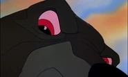 The Bear getting really angry at Tod from biting his fur, about to swipe Tod off his fur with his left paw