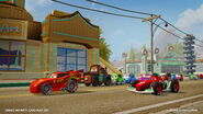 Lightning, Mater, Francesco, and some townspeople preparing to race.