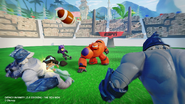 Baymax playing football with Hiro and Jasmine.