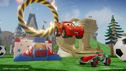 Lightning McQueen doing stunts in front of the Cave of Wonders.