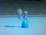 Elsa holding her costume