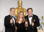 Jennifer Lee, Chris Buck, and Peter Del Vecho pose in the press room the 86th annual Academy Awards in February 2014..