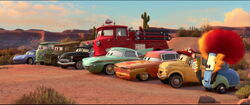 Guido cheering on for McQueen in the Radiator Springs Grand Prix.