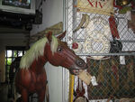 Horse and various props at the Studio Backlot Tour queue.