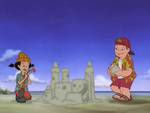 Spinelli building sandcastles with T.J.