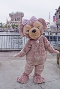 ShellieMay the Disney Bear posing for a photo in American Waterfront at Tokyo DisneySea.