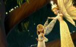 Queen Clarion using pixie dust on Tinkerbell's wings