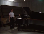 IntheMiddleoftheRiverBehindtheScenes.png (3.68 MB) Menken and Schwartz singing the song together in a Behind the Scenes clip