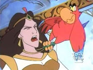 Iago tries to snatch her powerful emerald away from Queen Deluca's neck to smash it for Aladdin.