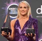 Carrie Underwood poses in the Press Room at the 2019 American Music Awards.