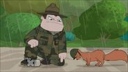 Buford tells a squirrel to do pushups in the rain.
