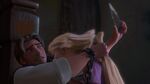 Eugene cutting Rapunzel's hair, sacrificing himself to save her.