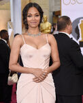 Zoë Saldaña arrives at the 87th annual Academy Awards in February 2015.