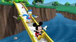 Mickey, donald and baby red bird slide on the slide