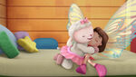 Lambie gives frida fairy a cuddle