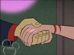 Jake holding Rose's hands