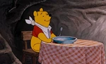 Winnie the Pooh is getting ready to eat some honey.jpg (407 KB)