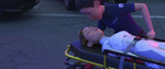 Abigail being taken to the hospital.