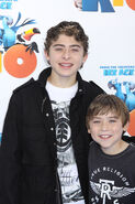 Raymond with his older brother, Ryan Ochoa at the premiere of Rio in March 2011.