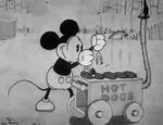 Mickey impaling hot dogs