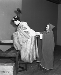 Stanley posing as Cinderella (with Claire Du Brey as the Fairy Godmother).