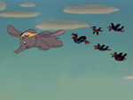 The Crows with Dumbo while singing When I See an Elephant Fly for the last time.