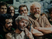 Miller and the men laughing when they learn that Robin Hood and Maid Marian are to be married