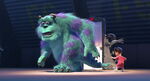 Boo tries to grab Sulley's tail.