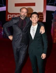 Ryan Potter and Scott Adsit at the Big Hero 6 premiere in November 2014.