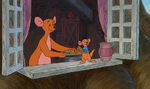 Kanga offers Pooh a cookie