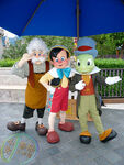 Pinocchio with Jiminy and Geppetto at one of the Disney Parks