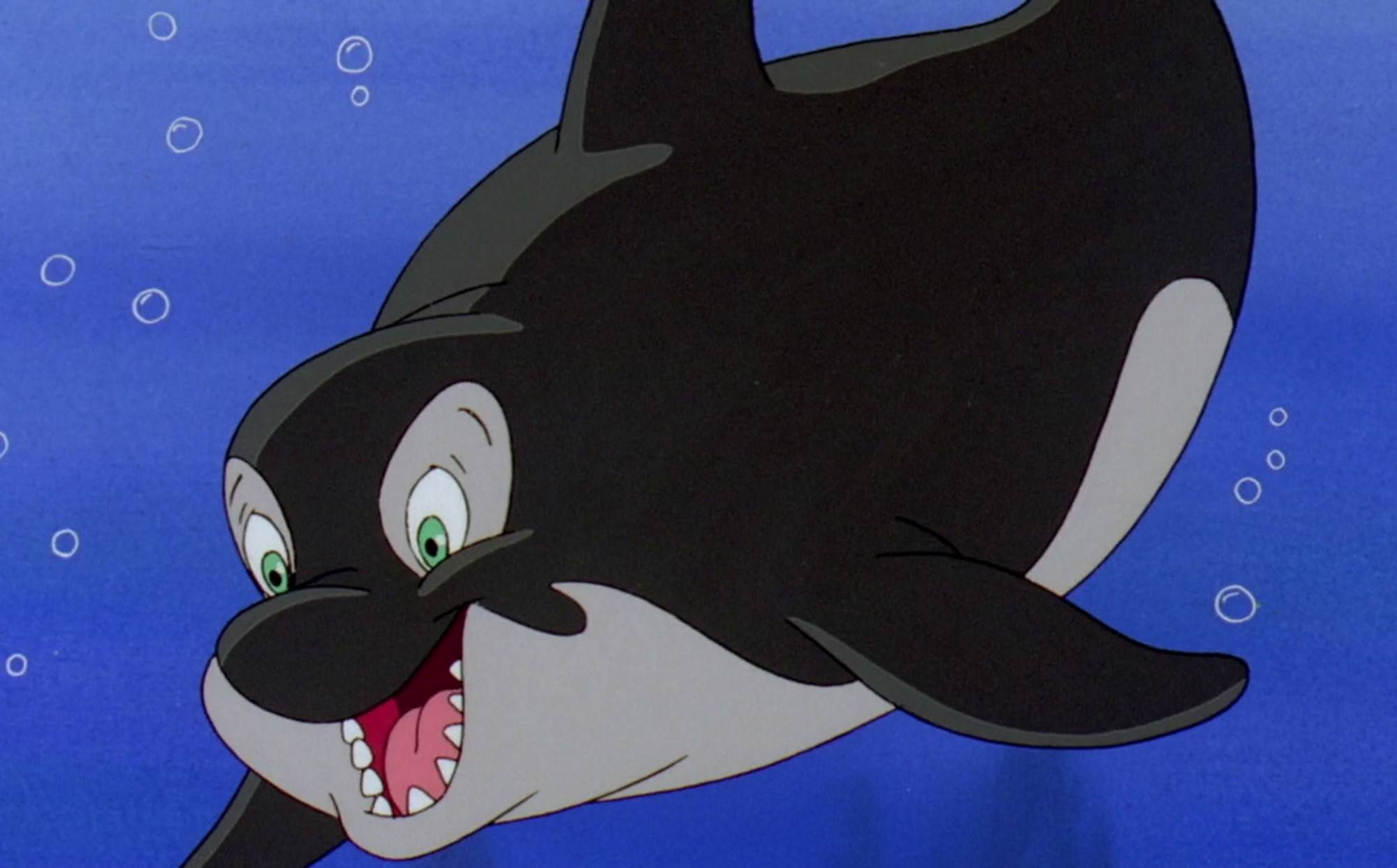 Mermaid swimming with an orca whale