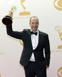 Tony Hale poses in the press room during the 65th annual Emmy Awards in September 2013.