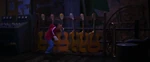 Miguel takes a guitar from the guitar collection which is located backstage.