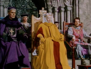 The Queen, the Archbishop, and Prince John told of Robin Hood and his men's actions and loyalty by Maid Marian when being shown their contribution by her