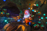 A raccoon next to Sneezy in Seven Dwarfs Mine Train