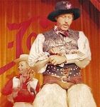 Wally Boag as "Pecos Bill" at the Golden Horseshoe Revue in the early 1970s. Betty Taylor as "Slue Foot Sue" in the background