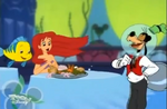 Ariel and Flounder with Goofy who serves them seafood