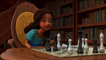 Isabel playing chess by herself