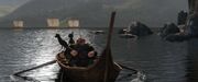 Fergus and his dogs sailing out to retrieve the triplets