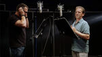 Steve Blum and Dee Bradley Baker collaborating in the recording studio.