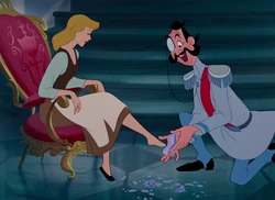The Grand Duke fitting the slipper on Cinderella.