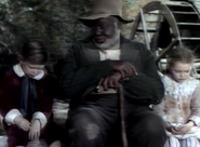 Uncle Remus telling the dejected Ginny and Johnny a story