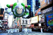 Buzz Lightyear flying high over Times Square in the 2011 parade.