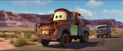Mater heading to see Lightning McQueen after returning home from his racing season.